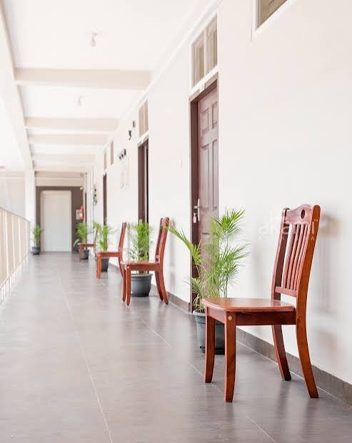 Corridor and seating area at AKAMI Ayurveda Hospital